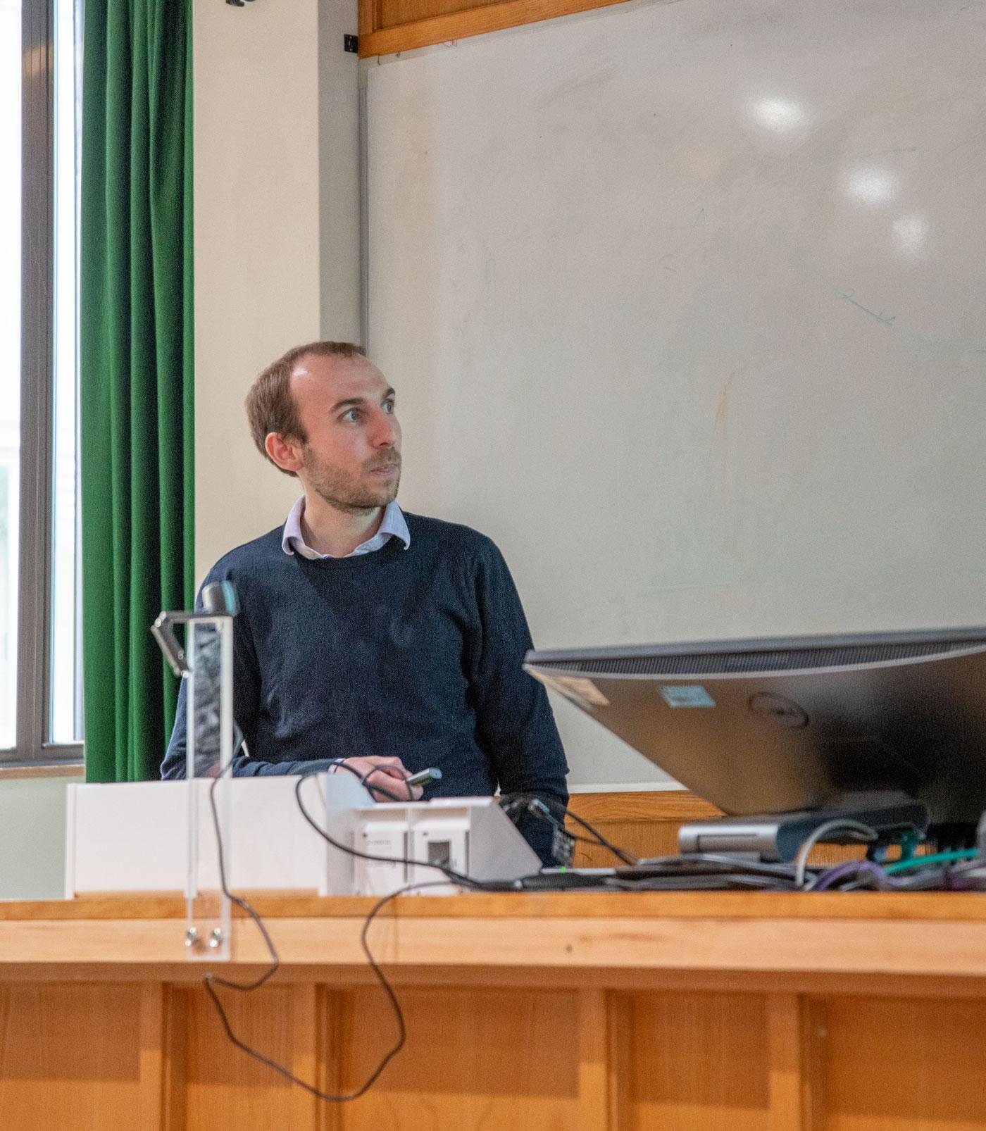 A photo of Samuel Liebana Garcia presenting his research to Unit colleagues.